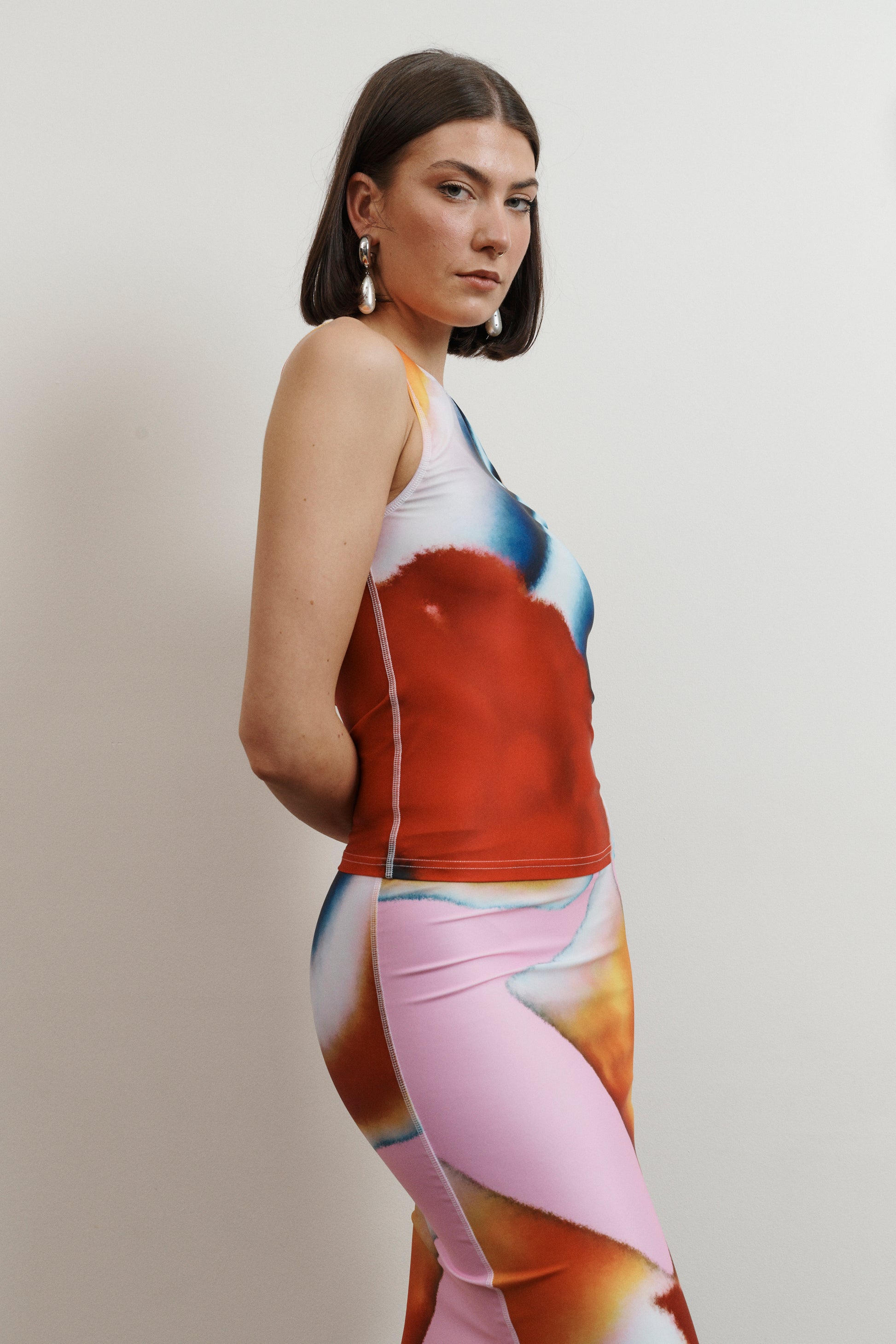 UMA KOURH calypso tank multi print blue white red orange sleeveless fitted jersey