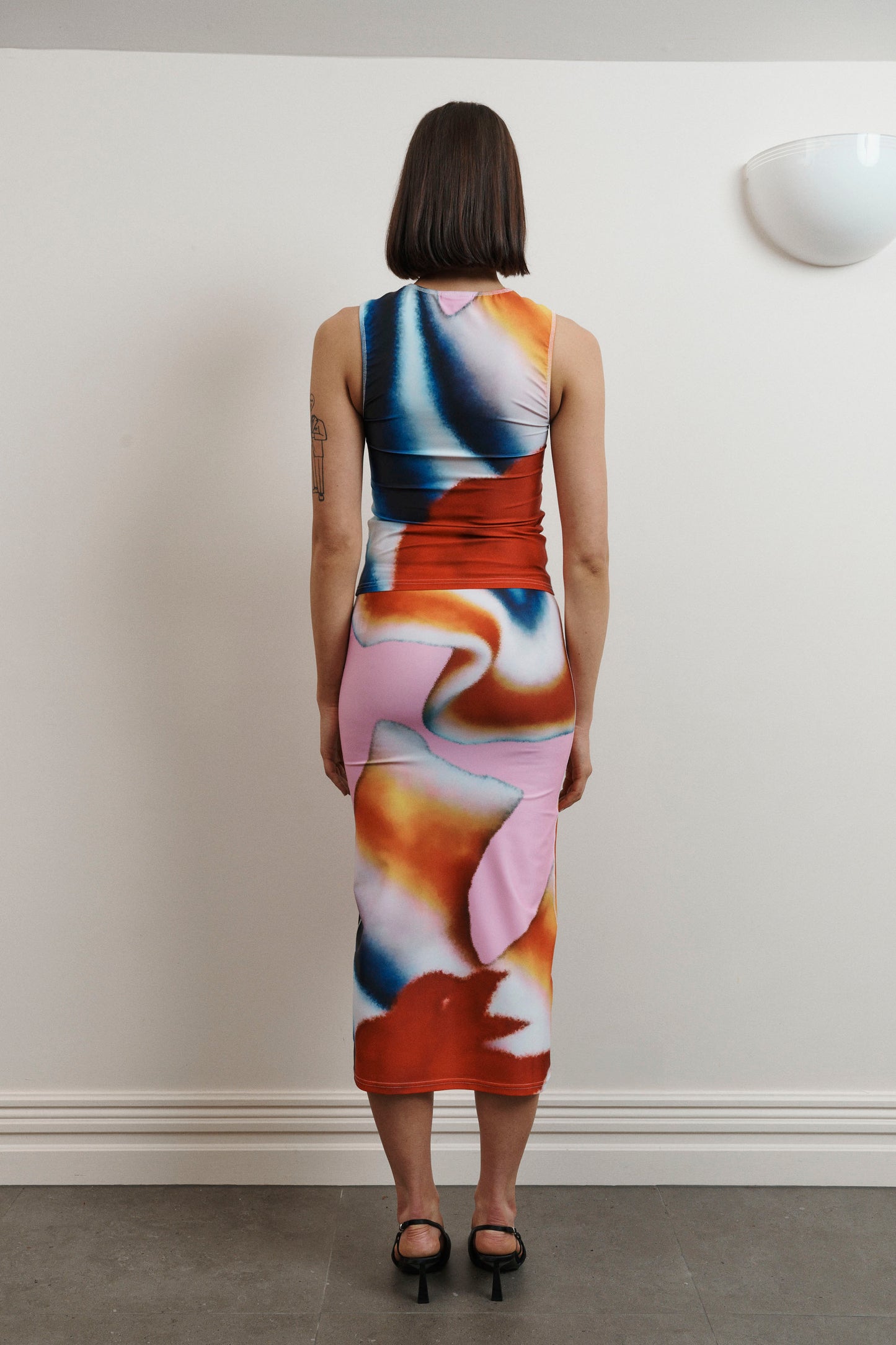 UMA KOURH calypso tank multi print blue white red orange sleeveless fitted jersey